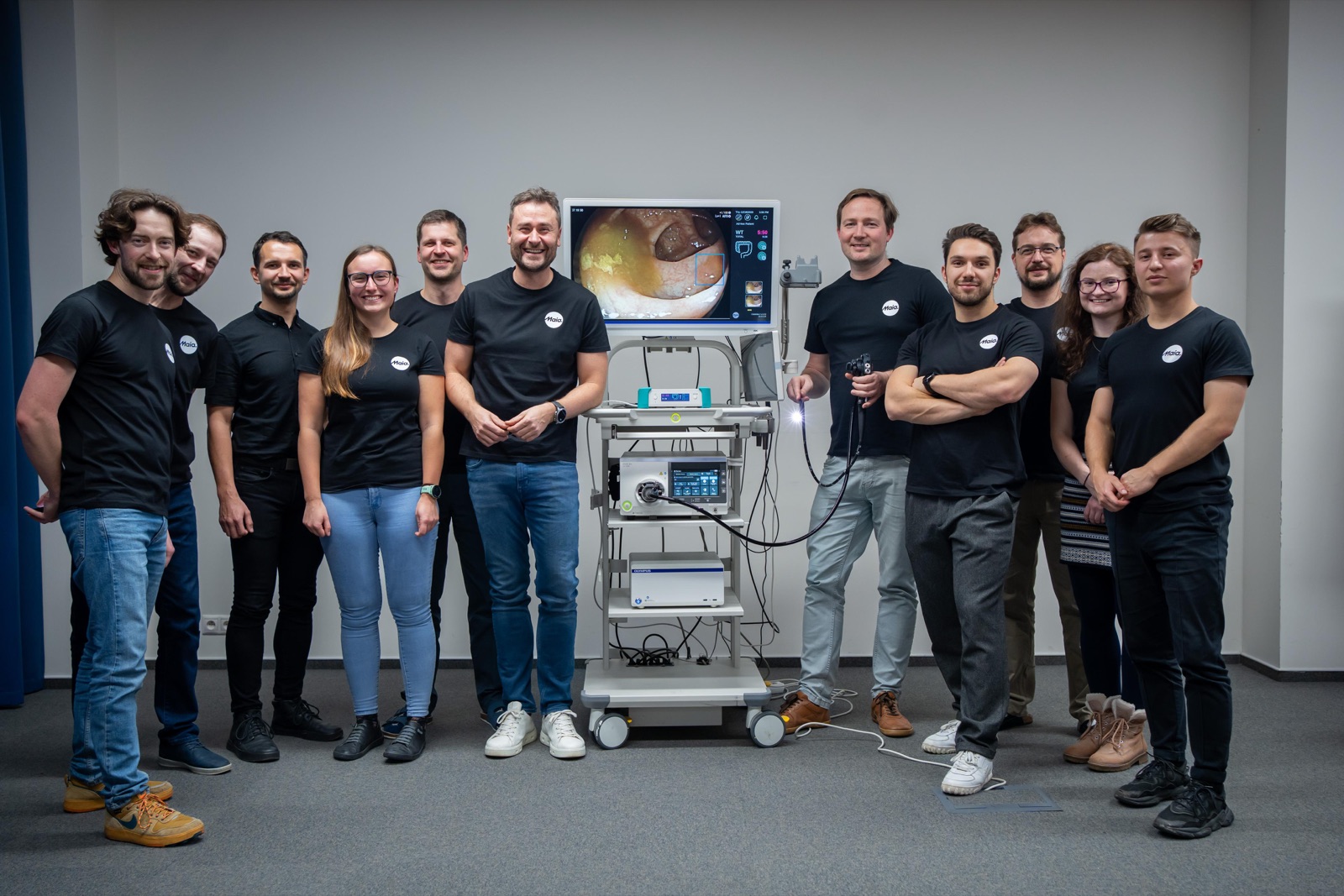 The MAIA Labs team together, with Petr holding an endoscope